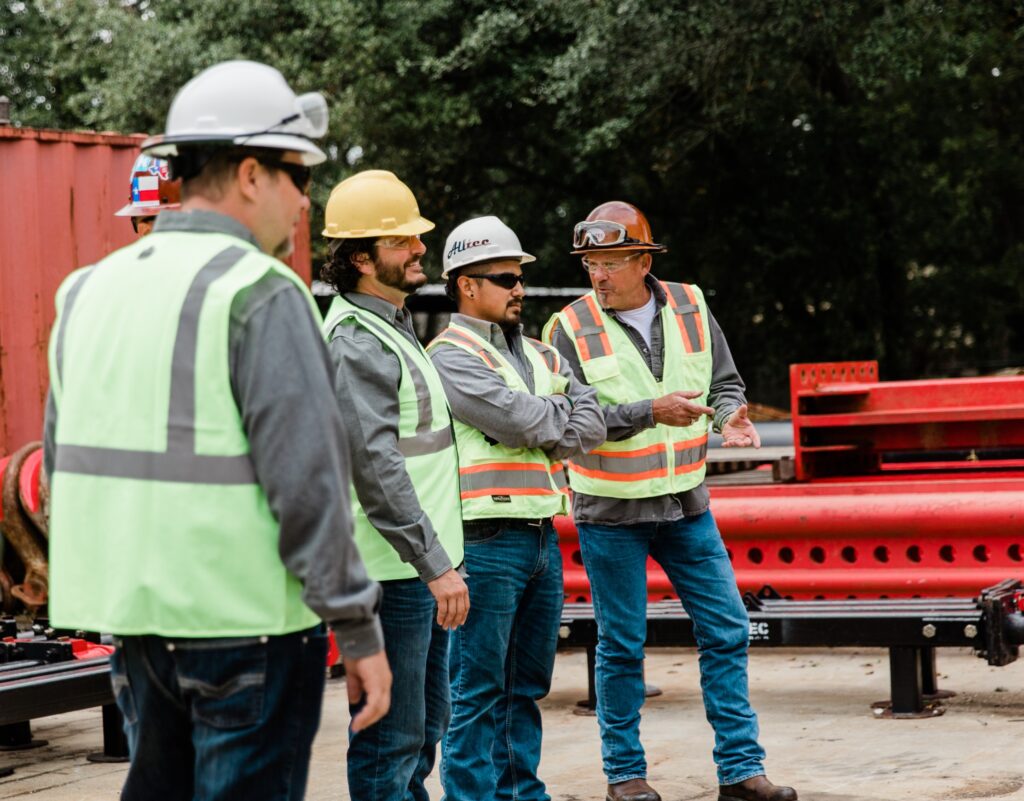 workers-hardhats-heavy-lift-heavy-load